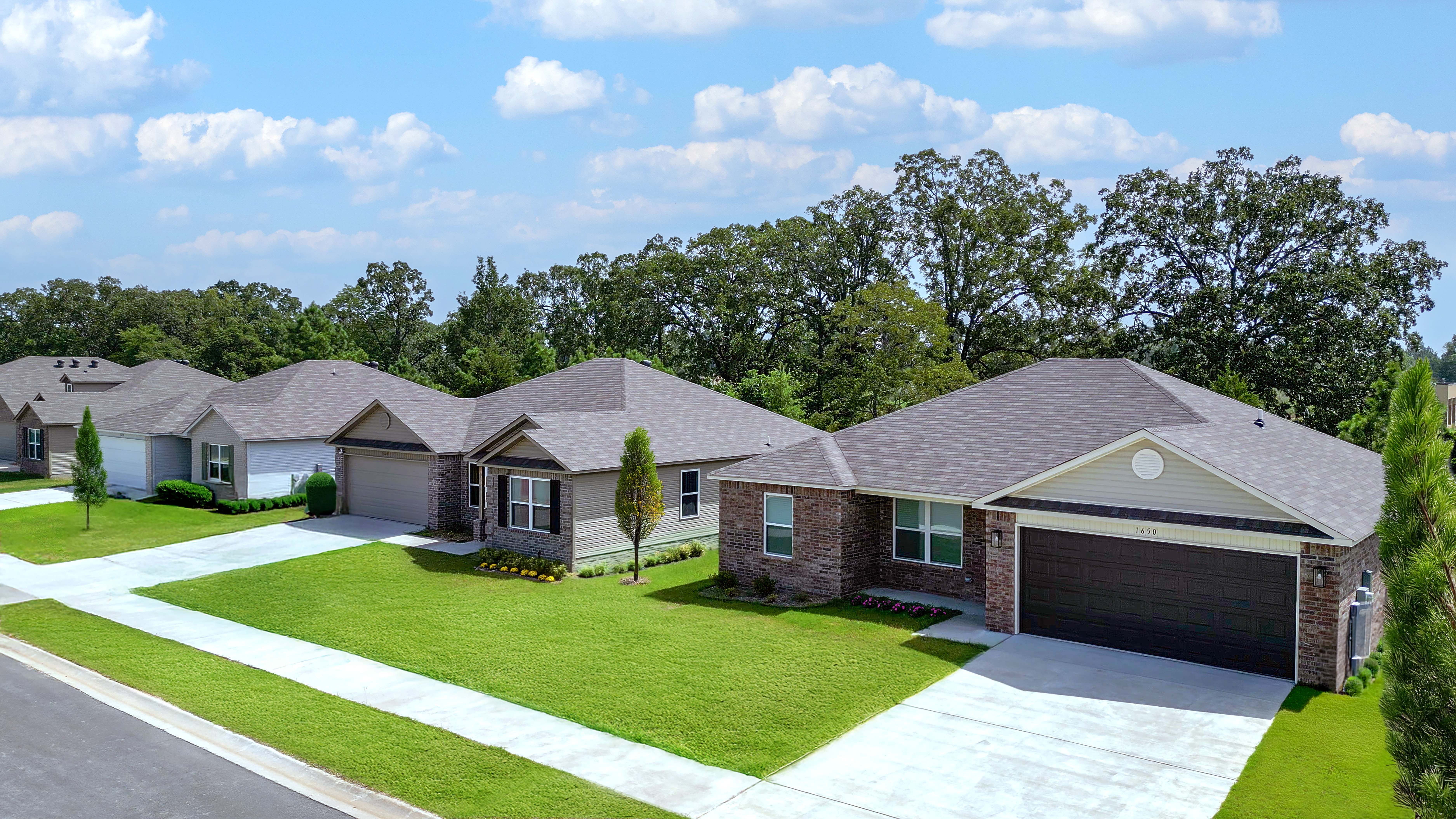 Lennar homes streetscape with manicured lawns